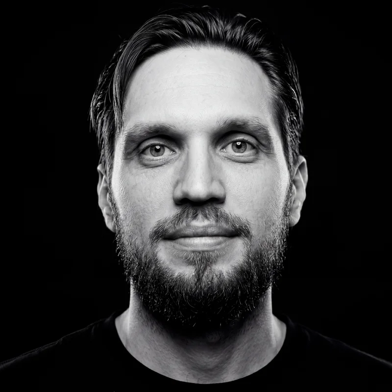 Artem Ryakin, black-and-white studio portrait